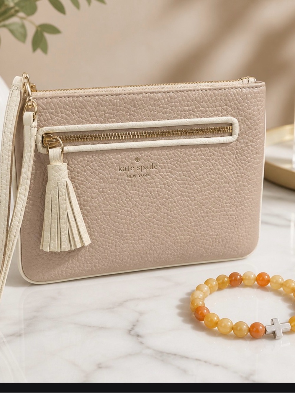 kate spade Blush Pebbled Leather Wristlet with Cream Trim & Tassel
